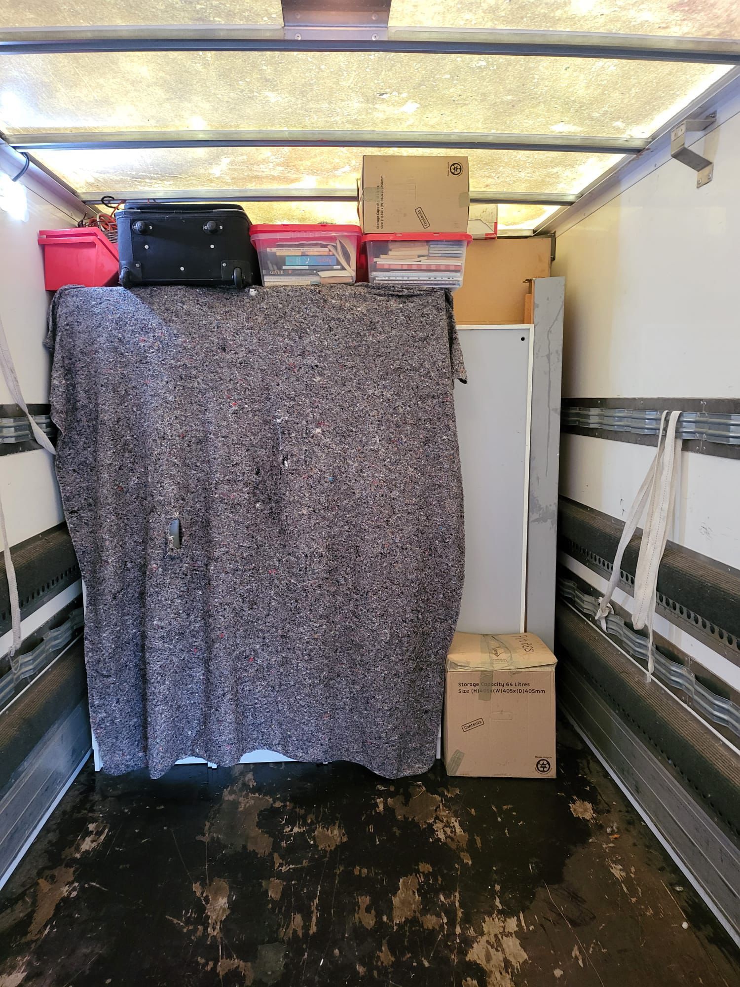 Protective covers on removal items in back of removal van Belfast | County Down | County Antrim