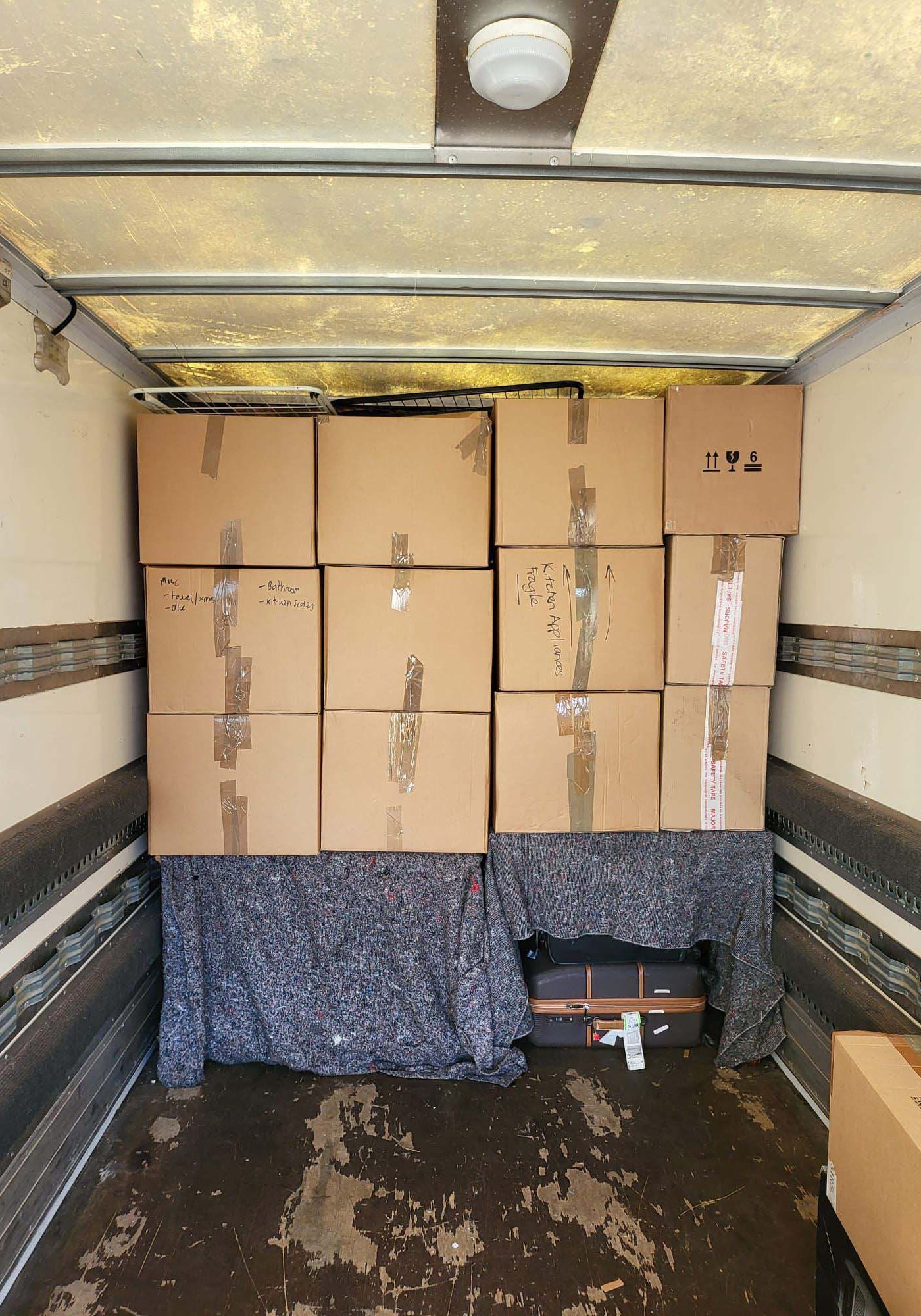 Cardboard boxes in back of removal van Belfast | County Down | County Antrim